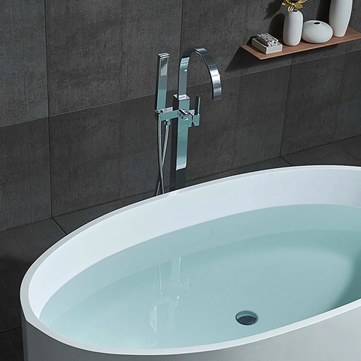 A oval shaped bath tub filled with water